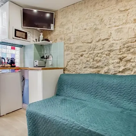 Tiny Boutique In 11 * Parigi